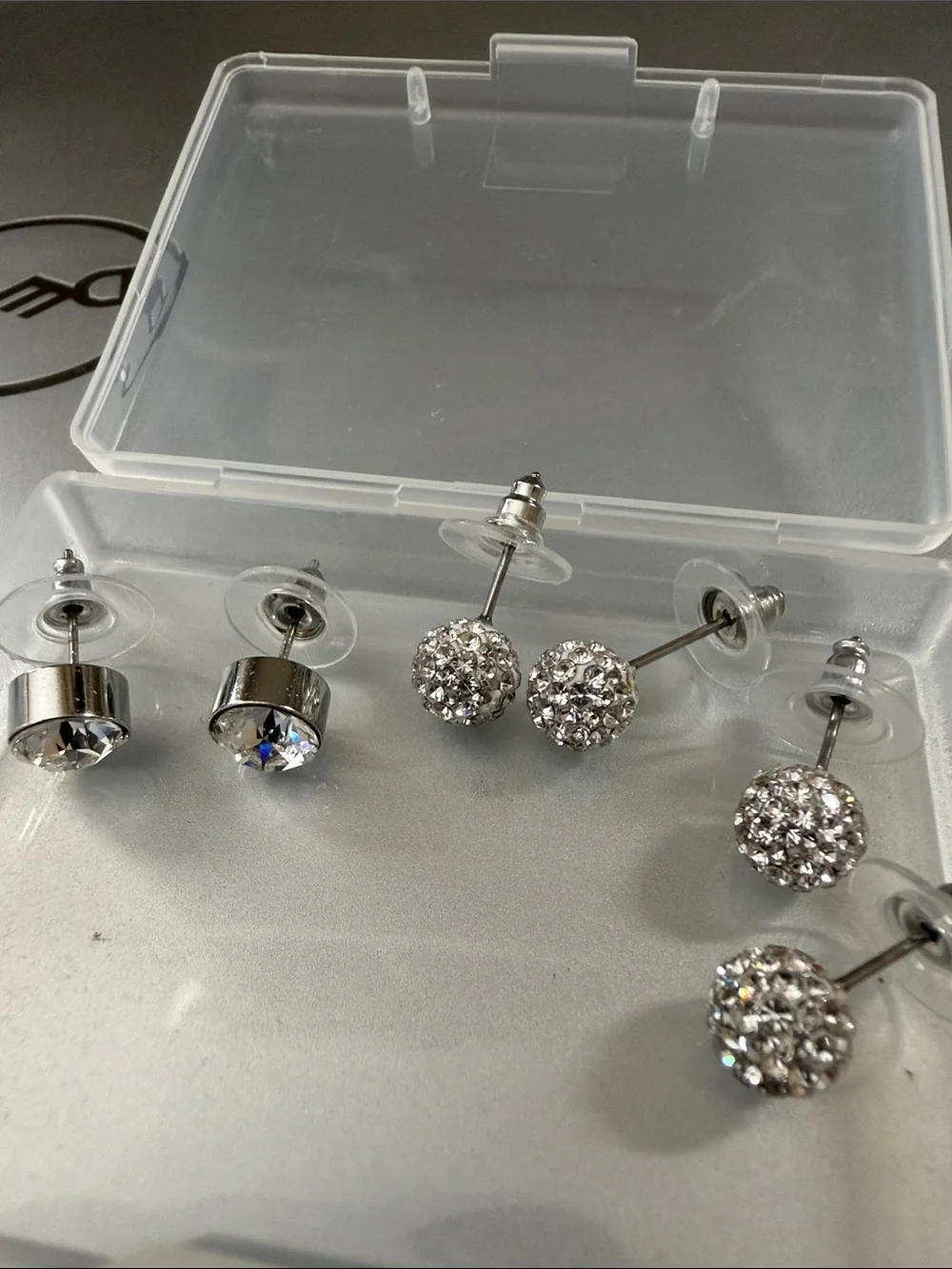 4 pairs sparkle studs. Never worn. So cute and sparkly.